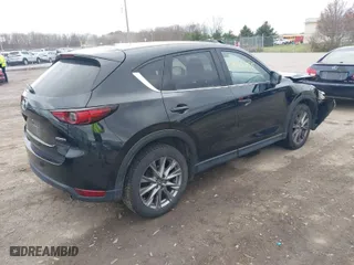 2021 Mazda CX-5 Grand Touring with VIN JM3KFBDMXM0456939, listed as a IAAI auction lot 40901055 with 113,540 mi miles. Bid and sale history available at carsss.com. Image 4.