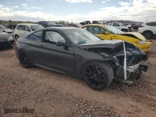 2015 BMW M4 with VIN WBS3R9C55FK333945, listed as a Copart auction lot 48896975 with 126,390 mi miles and Salvage Title. Bid and sale history available at carsss.com. Image 4.