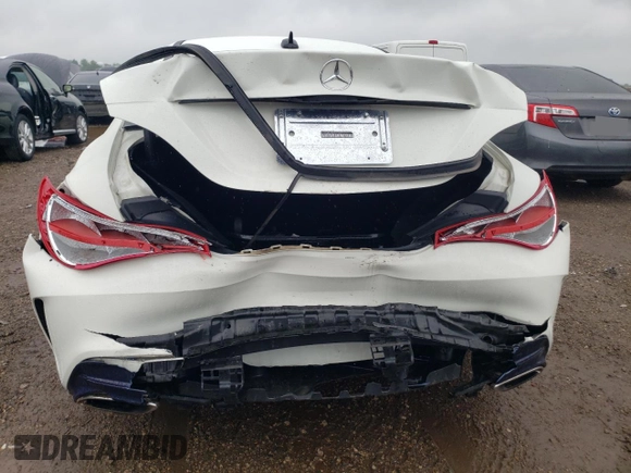 2018 Mercedes-Benz CLA 250 with VIN WDDSJ4EB9JN577269, listed as a Copart auction lot 59311595 with 50,581 mi miles and Salvage title. Bid and sale history available at DreamBid. Image 6.