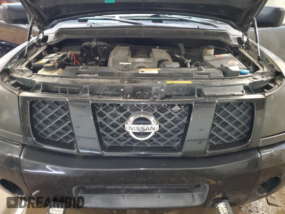 2006 Nissan Titan SE with VIN 1N6BA06A96N567659, listed as a Copart auction lot 61928495 with 190,594 mi miles and Salvage title. Bid and sale history available at DreamBid. Image 11.