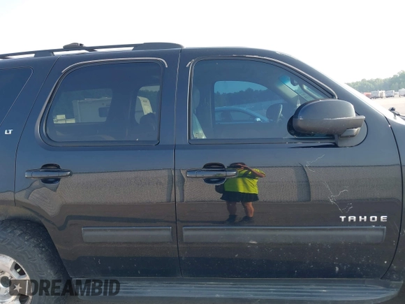 2014 Chevrolet Tahoe LT with VIN 1GNSCBE01ER235571, listed as a IAAI auction lot 42403118 with 238,069 mi miles and . Bid and sale history available at DreamBid. Image 13.