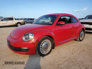 2014 Volkswagen Beetle 2.5L w/Sun with VIN 3VWJP7AT6EM624923, listed as a Copart auction lot 78641794 with 85,000 mi miles and Salvage Title. Bid and sale history available at DreamBid. Image 1.