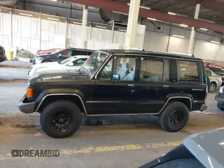 1991 Isuzu Trooper z VIN JACCH58R8M7902476, wystawiony jako IAAI lot #41893980 z przebiegiem 169 269 mil mil oraz . Historia ofert i sprzedaży dostępna na DreamBid. Obrazek 14.