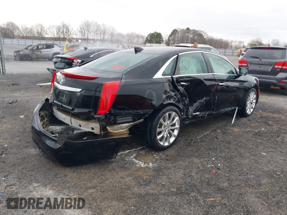 2015 Cadillac XTS Luxury with VIN 2G61M5S38F9138545, listed as a IAAI auction lot 41690696 with 136,460 mi miles and . Bid and sale history available at DreamBid. Image 4.