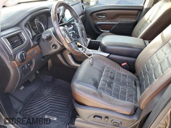 2016 Nissan Titan XD Platinum Reserve with VIN 1N6BA1F25GN506566, listed as a Copart auction lot 74627704 with 87,012 mi miles and Salvage Title. Bid and sale history available at carsss.com. Image 7.