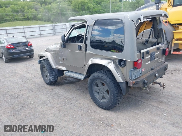 2004 Jeep Wrangler Sahara with VIN 1J4FA59S54P740417, listed as a IAAI auction lot 42382078 with 200,108 mi miles and . Bid and sale history available at DreamBid. Image 3.