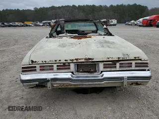 1975 Chevrolet Caprice z VIN 1N67H5Y196275, wystawiony jako Copart lot #43452985 z przebiegiem 28 996 mil mil oraz Czysty tytuł • Clean title. Historia ofert i sprzedaży dostępna na DreamBid. Obrazek 6.