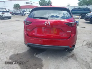 2019 Mazda CX-5 Touring with VIN JM3KFACM6K1549234, listed as a IAAI auction lot 42036633 with 85,065 mi miles and . Bid and sale history available at carsss.com. Image 17.