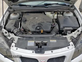 2009 Pontiac G6 1SA z VIN 1G2ZG57N394176715, wystawiony jako Copart lot #58756565 z przebiegiem 137 416 mil mil oraz Czysty tytuł • Clean title. Historia ofert i sprzedaży dostępna na DreamBid. Obrazek 11.