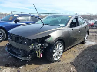 2014 Mazda 3 S Grand Touring with VIN JM1BM1M39E1149581, listed as a IAAI auction lot 41813917 with 143,019 mi miles and . Bid and sale history available at DreamBid. Image 2.
