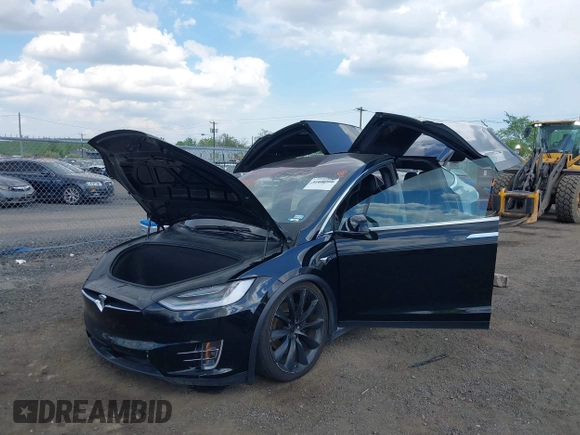 2019 Tesla Model X 75D with VIN 5YJXCBE21KF180203, listed as a IAAI auction lot 42190255 with 114,294 mi miles and . Bid and sale history available at DreamBid. Image 19.