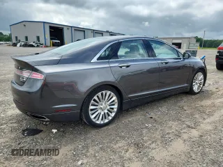 2016 Lincoln MKZ z VIN 3LN6L2G94GR613505, wystawiony jako Copart lot #60842925 z przebiegiem 55 154 mil mil oraz Szkoda całkowita • Salvage title. Historia ofert i sprzedaży dostępna na DreamBid. Obrazek 3.