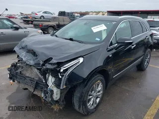 2021 Cadillac XT5 FWD Premium Luxury with VIN 1GYKNCRS3MZ103893, listed as a IAAI auction lot 41286761 with 75,728 mi miles and . Bid and sale history available at carsss.com. Image 18.