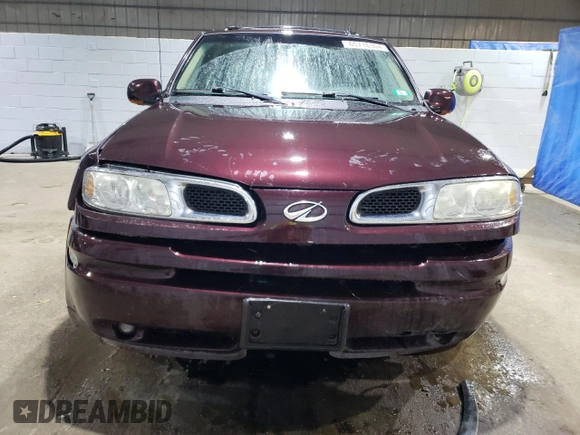 2004 Oldsmobile Bravada z VIN 1GHDT13S242297188, wystawiony jako Copart lot #65716304 z przebiegiem 170 548 mil mil oraz Szkody całkowita. Historia ofert i sprzedaży dostępna na DreamBid. Obrazek 5.