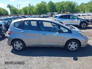 2009 Honda Fit with VIN JHMGE882X9S000639, listed as a IAAI auction lot 42308524 with 211,128 mi miles and . Bid and sale history available at DreamBid. Image 13.
