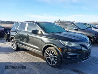 2015 Lincoln MKC with VIN 5LMCJ1A90FUJ03877, listed as a IAAI auction lot 41442942 with 197,000 mi miles. Bid and sale history available at carsss.com. Image 1.