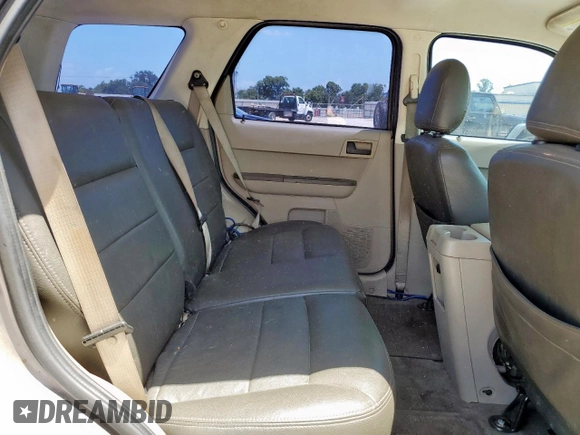 2009 Ford Escape XLS with VIN 1FMCU02739KC12318, listed as a Copart auction lot 61251485 with 179,335 mi miles and Salvage title. Bid and sale history available at DreamBid. Image 11.