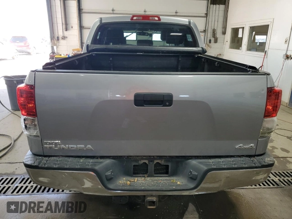2012 Toyota Tundra 4WD Truck with VIN 5TFDM5F1XCX037961, listed as a Copart auction lot 76289994 with 55,944 mi miles and Salvage Title. Bid and sale history available at carsss.com. Image 6.