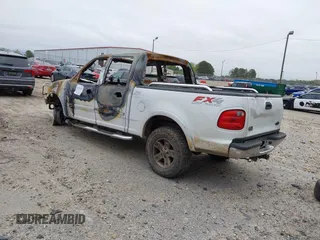 2002 Ford F-150 XLT with VIN 1FTRW08L32KE34232, listed as a IAAI auction lot 41930210 with 1 mi miles. Bid and sale history available at carsss.com. Image 3.