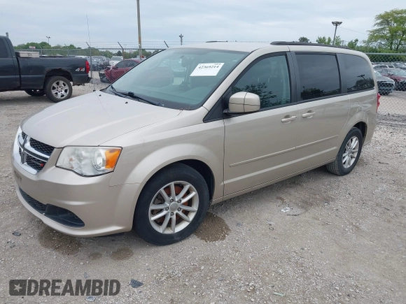 2014 Dodge Grand Caravan SXT z VIN 2C4RDGCG2ER372983, wystawiony jako IAAI lot #42369214 z przebiegiem 148 756 mil mil oraz . Historia ofert i sprzedaży dostępna na DreamBid. Obrazek 2.