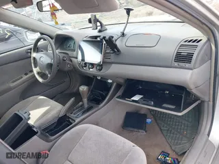 2003 Toyota Camry LE with VIN 4T1BE32K33U726440, listed as a IAAI auction lot 41831850 with 999,999 mi miles. Bid and sale history available at carsss.com. Image 5.