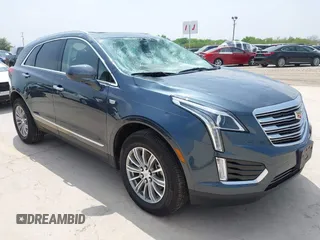 2019 Cadillac XT5 Luxury FWD z VIN 1GYKNCRS1KZ259282, wystawiony jako IAAI lot #41921030 z przebiegiem 27 880 mil mil oraz . Historia ofert i sprzedaży dostępna na DreamBid. Obrazek 1.