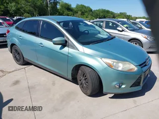 2012 Ford Focus SE with VIN 1FAHP3F20CL356322, listed as a IAAI auction lot 42088397 with 130,600 mi miles. Bid and sale history available at carsss.com. Image 1.