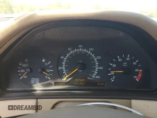 1998 Mercedes-Benz E with VIN WDBJF82F4WX012153, listed as a Copart auction lot 51848665 with 121,867 mi miles and Salvage Title. Bid and sale history available at DreamBid. Image 9.