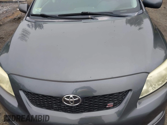 2009 Toyota Corolla with VIN 2T1BU40E29C156642, listed as a IAAI auction lot 42214601 with 255,813 mi miles. Bid and sale history available at carsss.com. Image 10.
