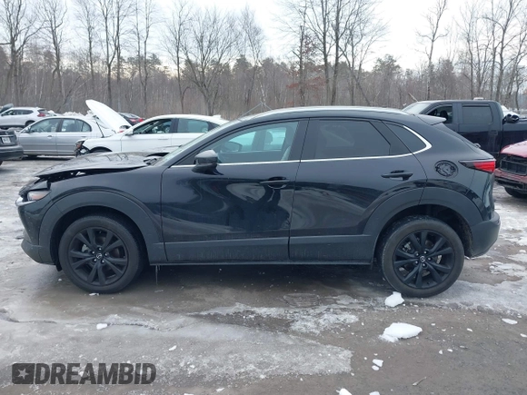2021 Mazda CX-30 Premium with VIN 3MVDMBDY1MM269353, listed as a IAAI auction lot 41644391 with 29,409 mi miles and . Bid and sale history available at carsss.com. Image 14.