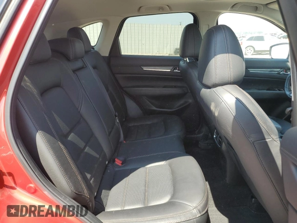 2019 Mazda CX-5 Grand Touring with VIN JM3KFBDM7K1668396, listed as a Copart auction lot 59732785 with 23,855 mi miles and Salvage title. Bid and sale history available at DreamBid. Image 11.