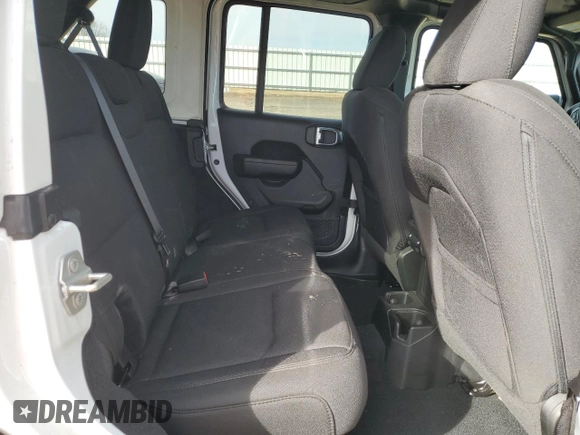 2023 Jeep Wrangler Sport S with VIN 1C4HJXDGXPW665818, listed as a Copart auction lot 48357105 with 9,803 mi miles and Clean Title. Bid and sale history available at DreamBid. Image 11.