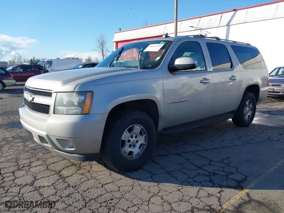 2009 Chevrolet Suburban LT w/2LT with VIN 1GNFC26099R177554, listed as a IAAI auction lot 38664519 with 311,063 mi miles. Bid and sale history available at carsss.com. Image 2.