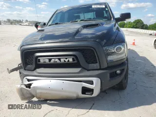2017 Ram 1500 Rebel z VIN 1C6RR7YT3HS553611, wystawiony jako Copart lot #56063905 z przebiegiem 136 239 mil mil oraz Szkoda całkowita • Salvage title. Historia ofert i sprzedaży dostępna na DreamBid. Obrazek 5.