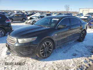 2014 Ford Taurus SEL z VIN 1FAHP2E89EG115127, wystawiony jako Copart lot #88134495 z przebiegiem 129 245 mil mil oraz Szkody całkowita. Historia ofert i sprzedaży dostępna na DreamBid. Obrazek 1.