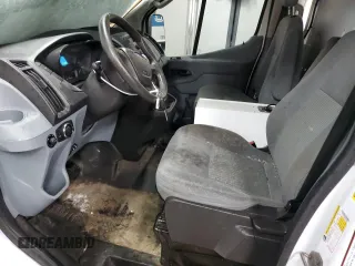 2015 Ford Transit Cargo with VIN 1FTNE1ZM0FKA59369, listed as a Copart auction lot 87335004 with 124,883 mi miles and Clean Title. Bid and sale history available at carsss.com. Image 7.