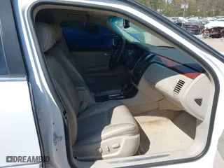 2007 Cadillac DTS Luxury I with VIN 1G6KD57Y17U126850, listed as a IAAI auction lot 41907481 with 123,977 mi miles. Bid and sale history available at carsss.com. Image 5.