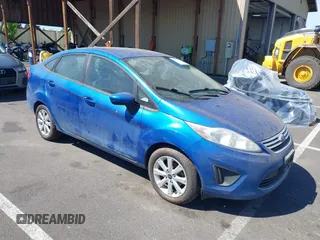 2011 Ford Fiesta SE with VIN 3FADP4BJ6BM145768, listed as a IAAI auction lot 42192387 with 159,825 mi miles and . Bid and sale history available at carsss.com. Image 1.