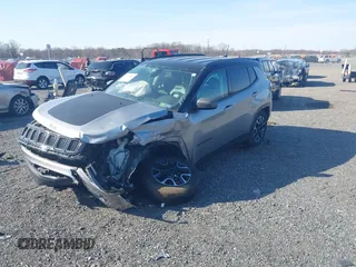 2020 Jeep Compass Trailhawk with VIN 3C4NJDDBXLT106663, listed as a IAAI auction lot 41791300 with 74,162 mi miles and . Bid and sale history available at carsss.com. Image 2.