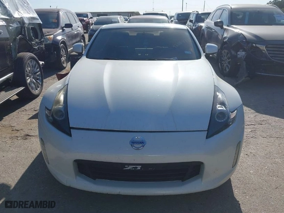 2018 Nissan 370Z Coupe Sport Tech with VIN JN1AZ4EH8JM571040, listed as a IAAI auction lot 42004760 with 115,923 mi miles. Bid and sale history available at carsss.com. Image 12.