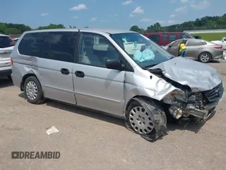 2004 Honda Odyssey LX with VIN 5FNRL18504B129349, listed as a IAAI auction lot 42393492 with 243,232 mi miles and . Bid and sale history available at DreamBid. Image 1.