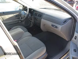 2000 Ford Taurus SE Standard z VIN 1FAFP582XYG181481, wystawiony jako IAAI lot #42033520 z przebiegiem 151 073 mil mil oraz . Historia ofert i sprzedaży dostępna na DreamBid. Obrazek 5.