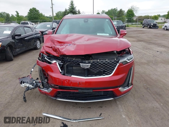 2024 Cadillac XT6 AWD Premium Luxury with VIN 1GYKPDRSXRZ724989, listed as a IAAI auction lot 42378559 with 22,520 mi miles and . Bid and sale history available at DreamBid. Image 12.