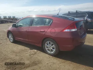 2010 Honda Insight EX with VIN JHMZE2H77AS025567, listed as a Copart auction lot 58499135 with 152,501 mi miles and Salvage title. Bid and sale history available at DreamBid. Image 2.