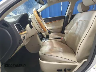 2012 Lincoln MKZ Hybrid with VIN 3LNDL2L32CR800650, listed as a Copart auction lot 47804425 with 120,905 mi miles and Clean title. Bid and sale history available at DreamBid. Image 7.