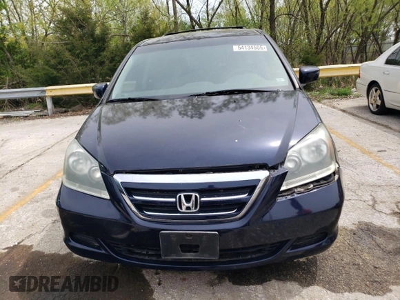 2007 Honda Odyssey EX with VIN 5FNRL38477B101619, listed as a Copart auction lot 54134505 with 129,468 mi miles and Clean title. Bid and sale history available at DreamBid. Image 5.