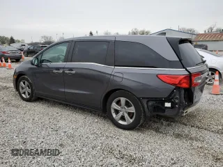 2018 Honda Odyssey EX-L with VIN 5FNRL6H78JB091153, listed as a Copart auction lot 52743715 with 69,849 mi miles and Salvage Title. Bid and sale history available at DreamBid. Image 2.
