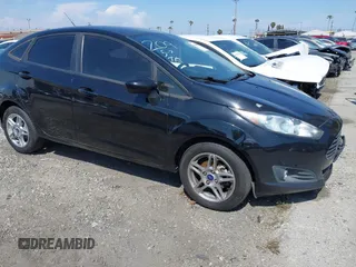 2018 Ford Fiesta SE with VIN 3FADP4BJ7JM115872, listed as a IAAI auction lot 41969970 with 156,537 mi miles. Bid and sale history available at carsss.com. Image 1.