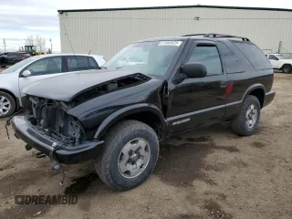 2005 Chevrolet Blazer LS z VIN 1GNCT18X65K103468, wystawiony jako Copart lot #51663025 z przebiegiem 180 451 mil mil oraz Szkoda całkowita • Salvage title. Historia ofert i sprzedaży dostępna na DreamBid. Obrazek 1.