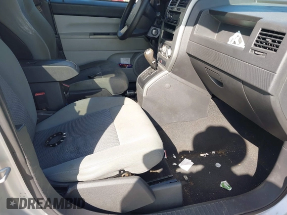 2007 Jeep Compass Sport with VIN 1J8FT47W57D185807, listed as a IAAI auction lot 41700283 with 194,339 mi miles. Bid and sale history available at carsss.com. Image 5.
